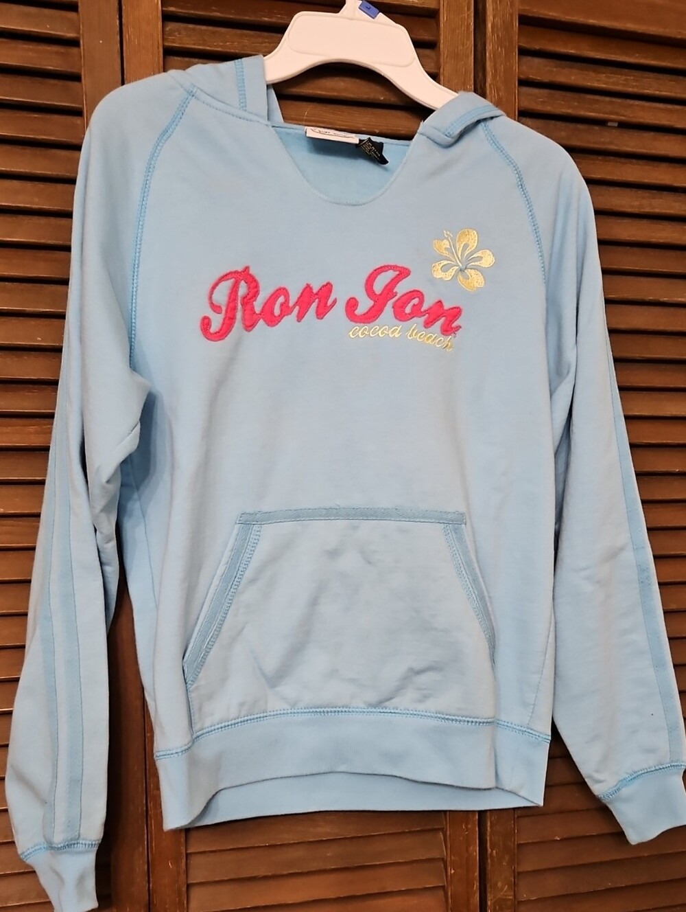 Ron Jon Light Blue Pullover Sweatshirt with Pink Logo and Yellow Accent